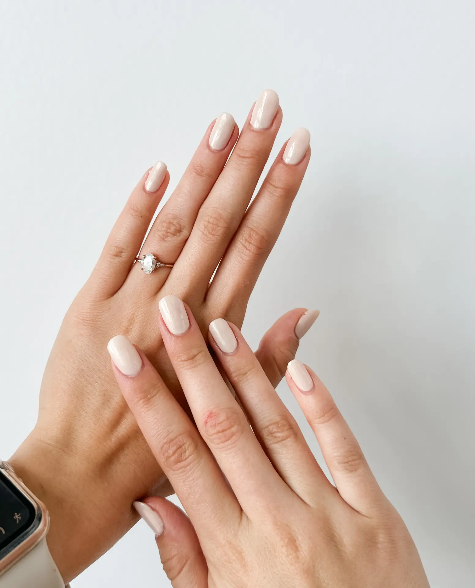 Natural nails with light polish from a manicure in DeKalb, Illinois